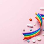 Probiotics vs. Fiber: The Gut Health Showdown Colorful pills and a rainbow ribbon on a pink background