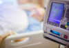 Chemo’s Hidden Aftershock on Your Immune System IV pump displaying medication flow rate in a hospital room