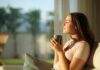 Green Tea’s Effect on Brain Decay Woman enjoying a cup of coffee in a sunlit room