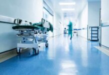 The “Nurse Shortage” Lie — The Real Crisis Hospital corridor with empty gurney