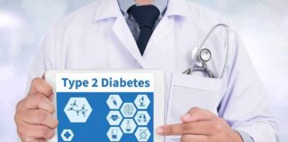 Doctor holding tablet about type 2 diabetes