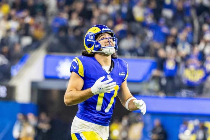 Los,Angeles,Rams,Wide,Receiver,Puka,Nacua,#17,Celebrates,After Football player in a blue and yellow uniform celebrating during a game