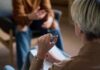 How to Maintain Relationships during Times of Political Differences Two individuals engaged in a conversation during a counseling session