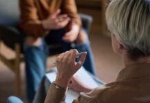 How to Maintain Relationships during Times of Political Differences Two individuals engaged in a conversation during a counseling session