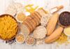 Assorted grains and breads on a wooden table