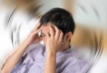 Stroke Rehab Myth DEBUNKED — Rest Isn’t Recovery Person holding head with spinning blur effect