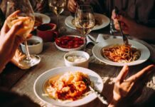 America’s Veggie Crisis: Seniors At Risk Pasta dinner with wine on a sunlit table