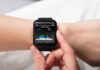 Health Wearables: What Your Data Can and Cannot Tell You smartwatch displaying heart rate on a person's wrist