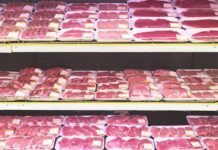 Packaged raw meat displayed on supermarket shelves